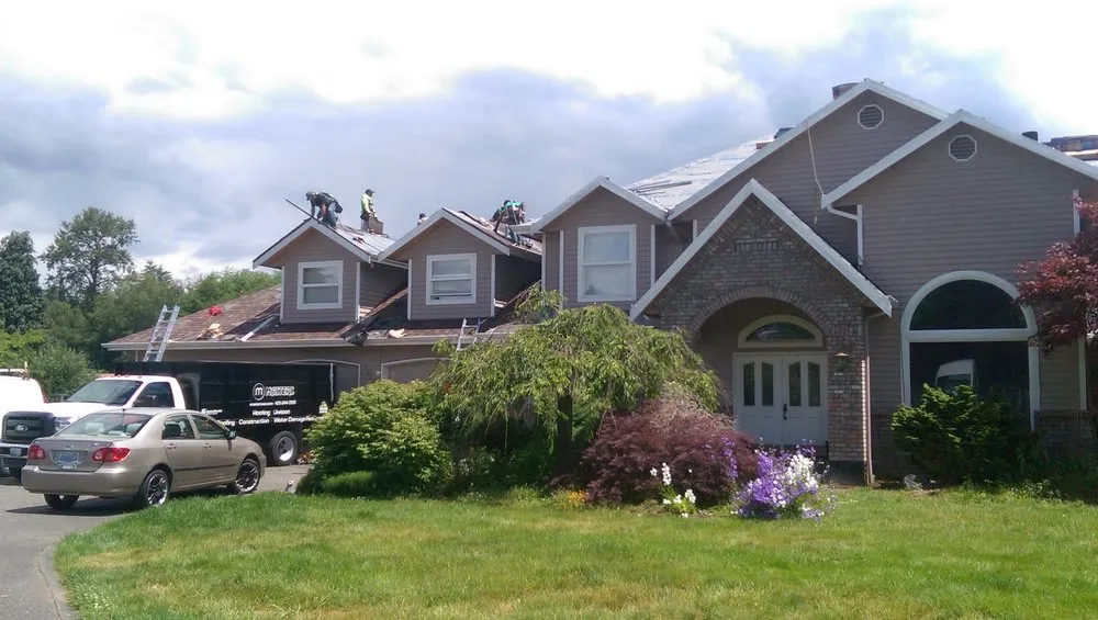 Slide of Masters Roofing