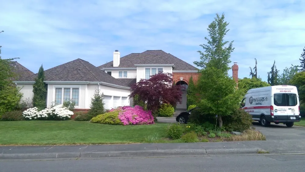 Slide of Masters Roofing