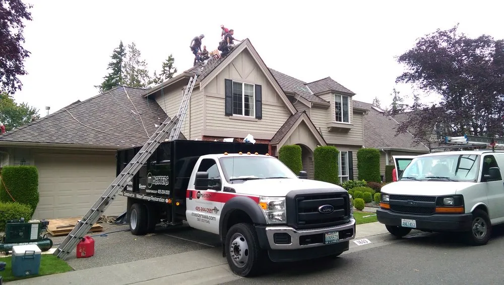 Slide of Masters Roofing