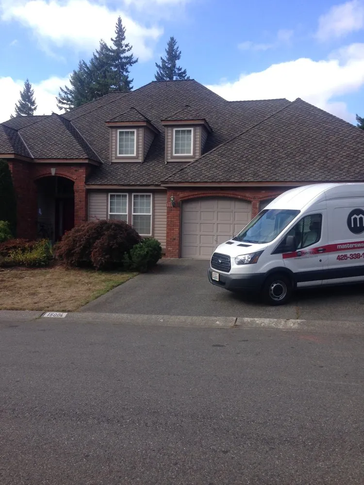 Slide of Masters Roofing