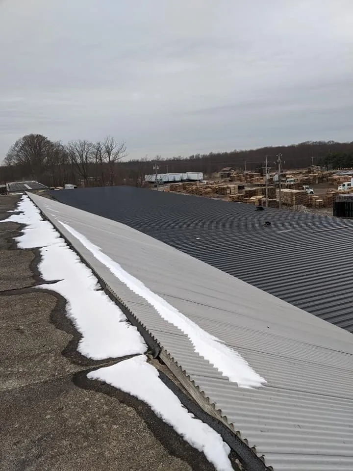 Slide of Mast's Top Choice Roofing