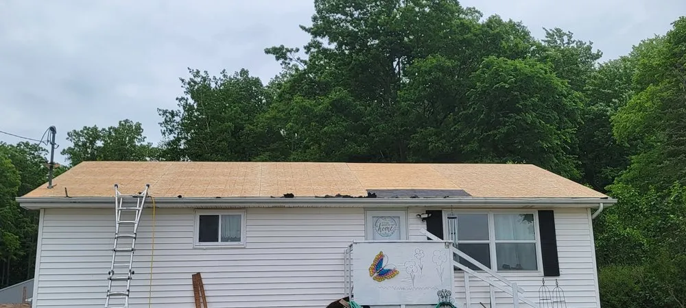 Slide of Mattew Taylors Roofing