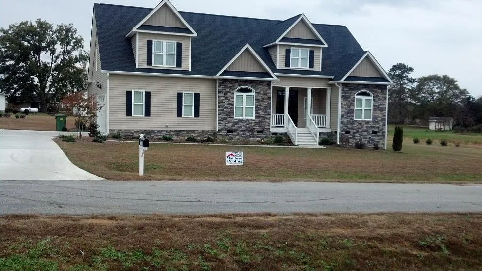 Slide of Matthews Roofing