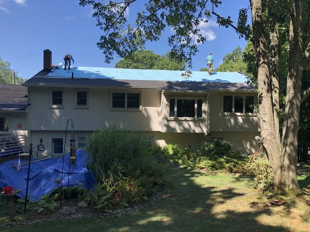 Slide of Matute Roofing