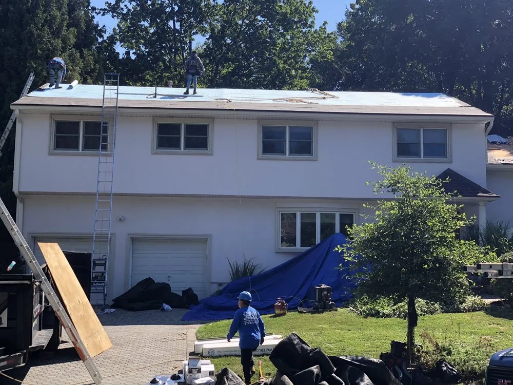 Slide of Matute Roofing