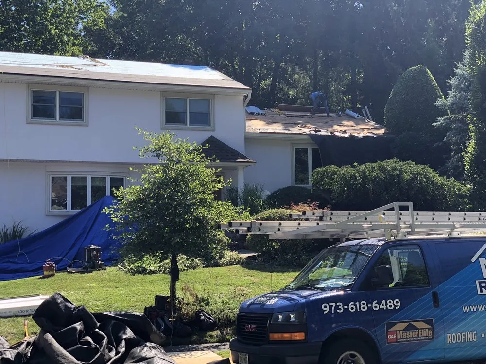 Slide of Matute Roofing