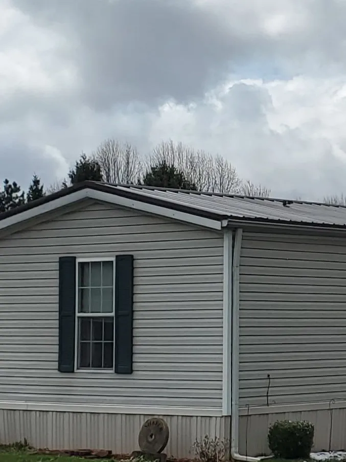 Slide of Mauz Roofing