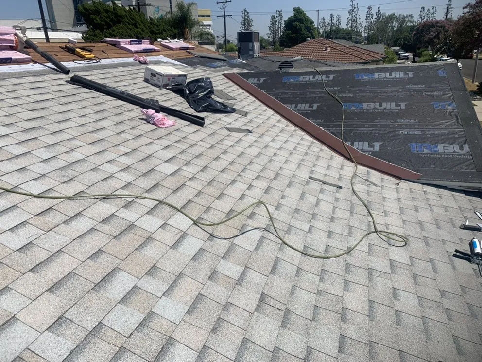 Slide of Maven Roofing Company