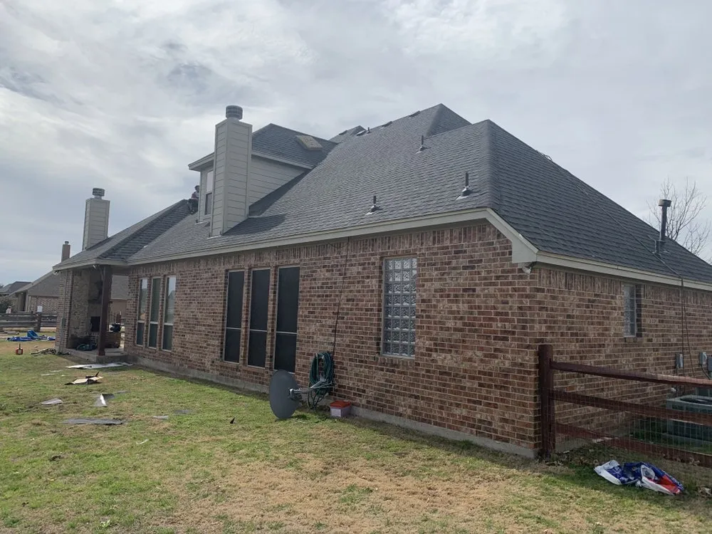 Slide of Maverick Roofing & Contracting