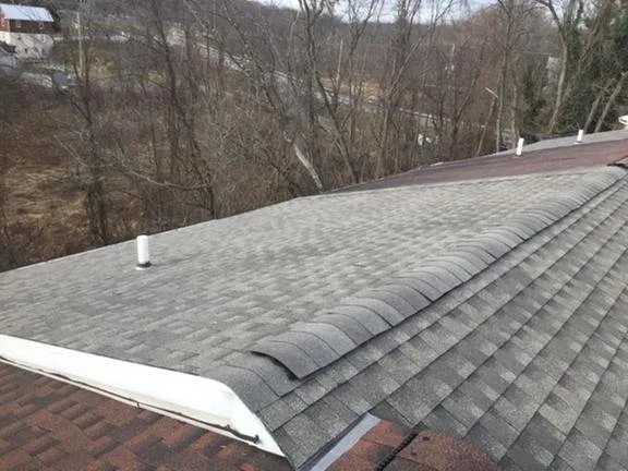 Slide of Maverick Roofing