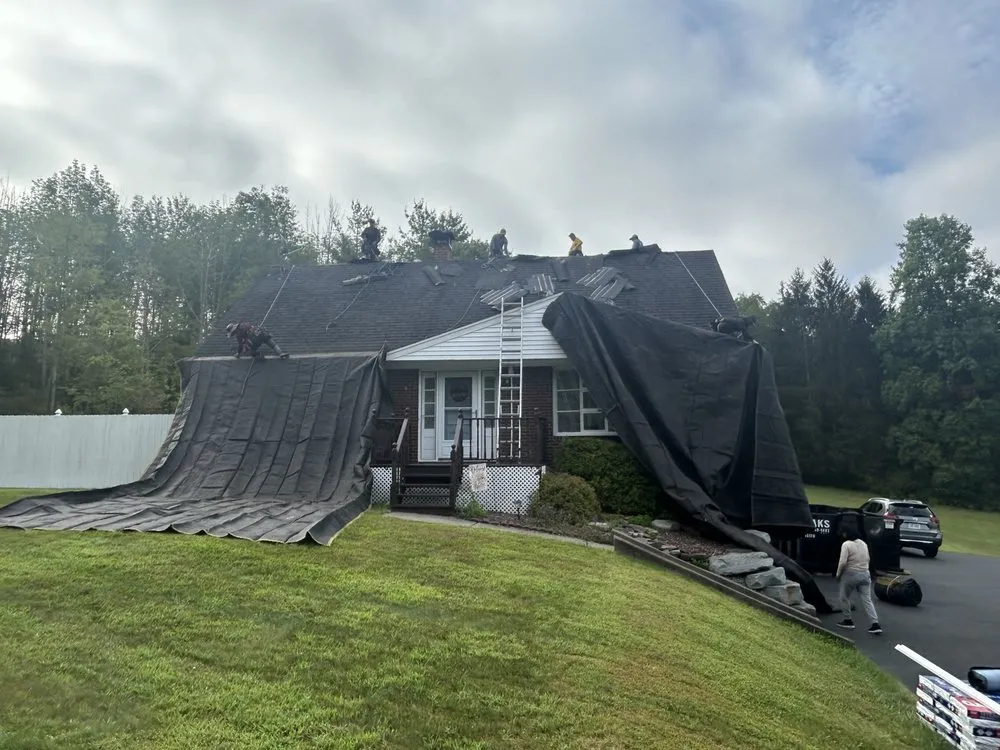 Slide of Max Roofing