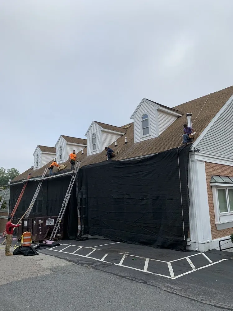 Slide of MAX ROOFING