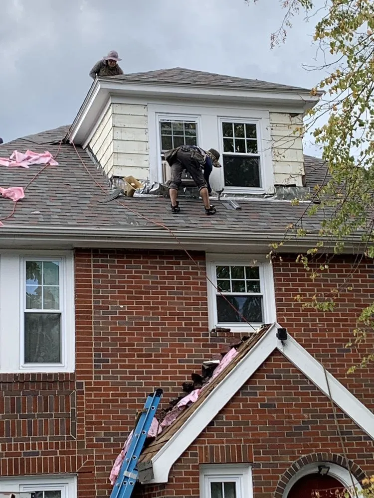 Slide of MAX ROOFING