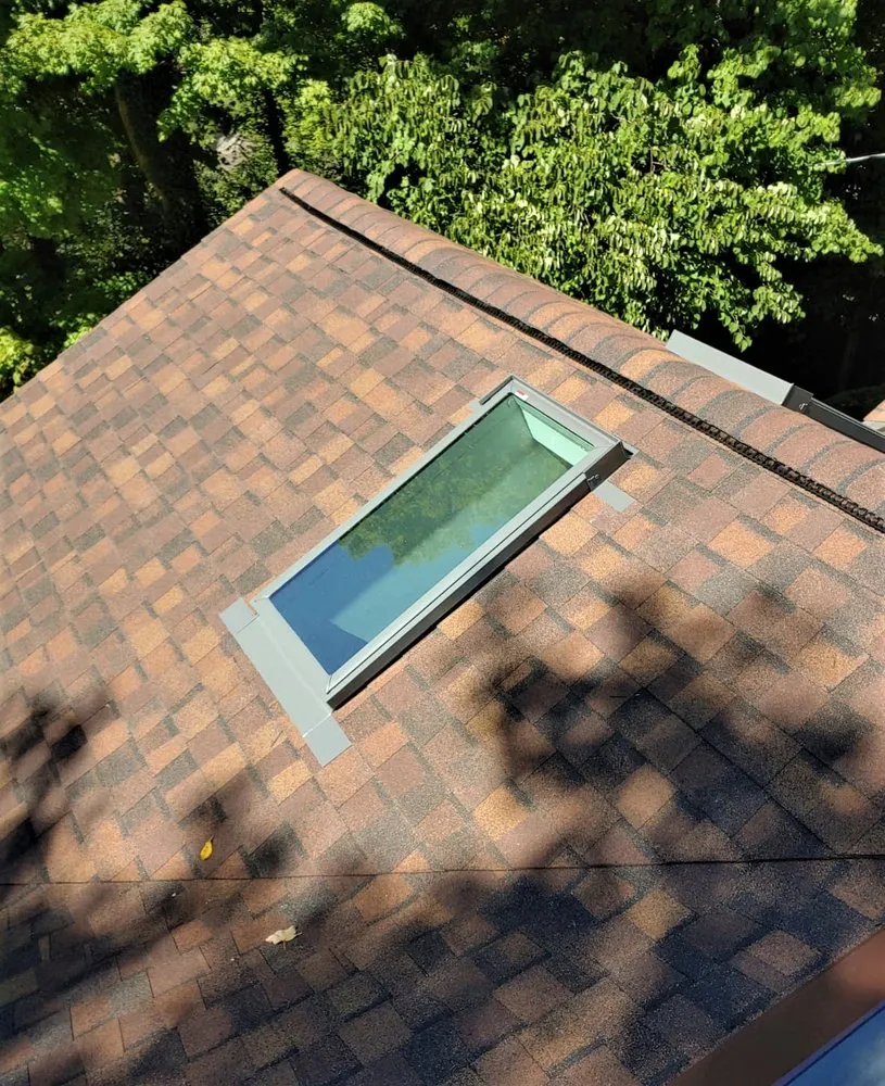 Slide of Maxim Roofing Co