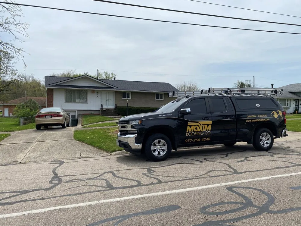 Slide of Maxim Roofing Co