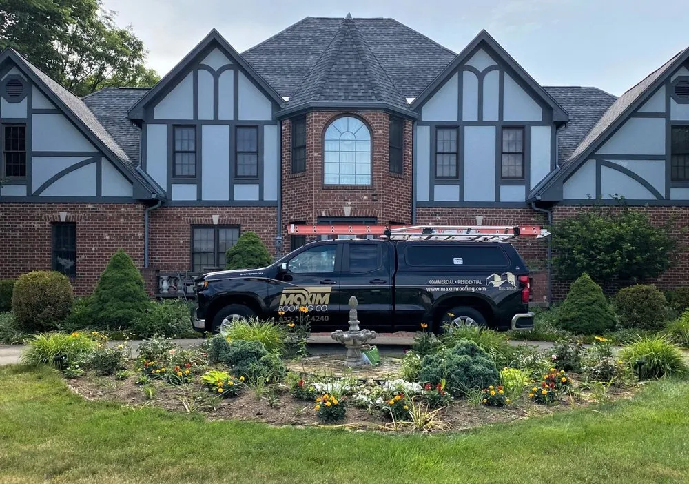 Slide of Maxim Roofing Co