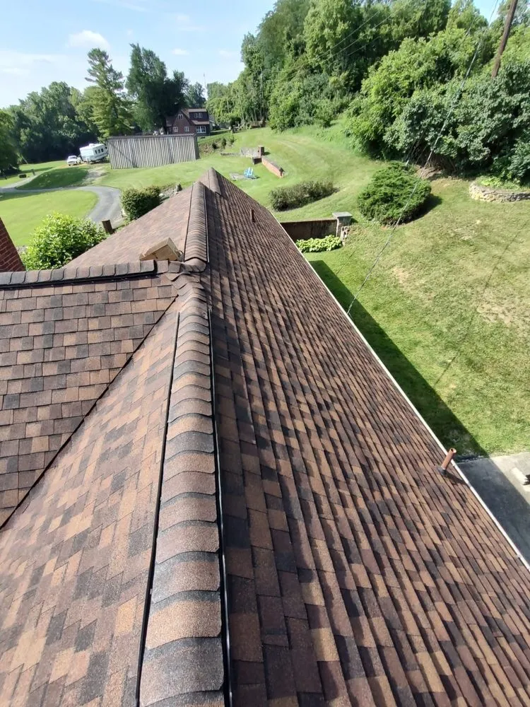 Slide of Maxim Roofing Co