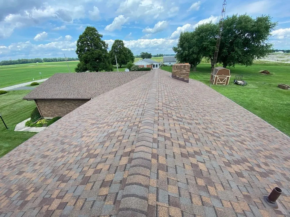 Slide of Maxim Roofing Co