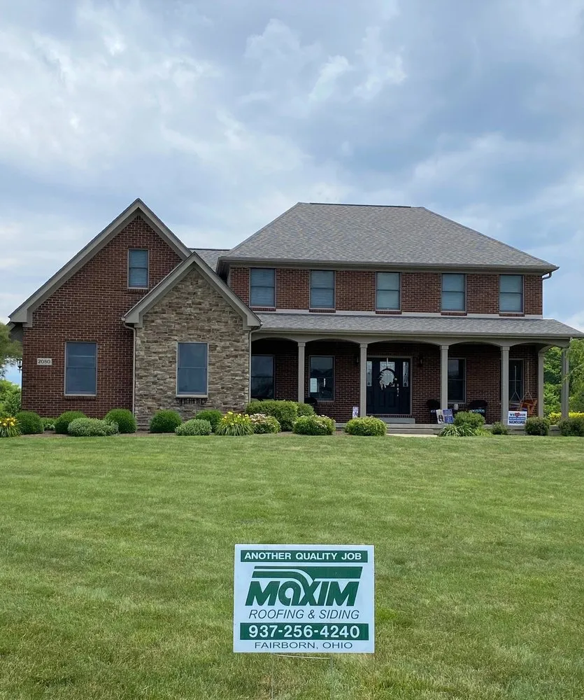 Slide of Maxim Roofing Co