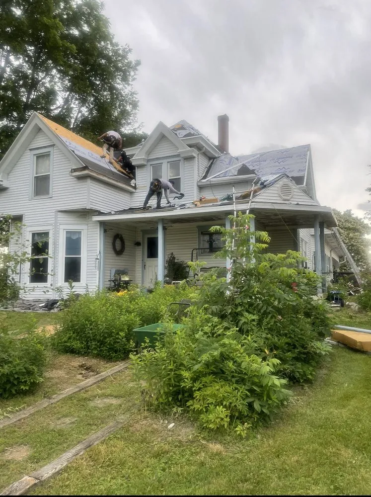 Slide of Maximond Roofing Company