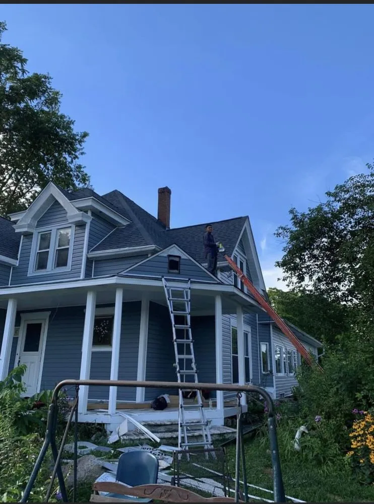 Slide of Maximond Roofing Company