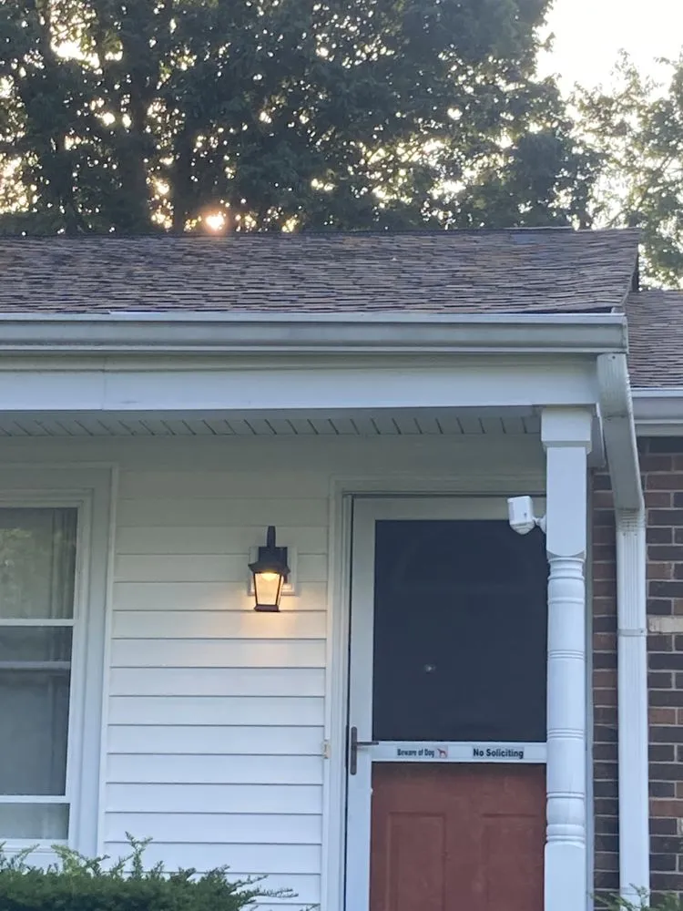 Slide of Maximond Roofing Company