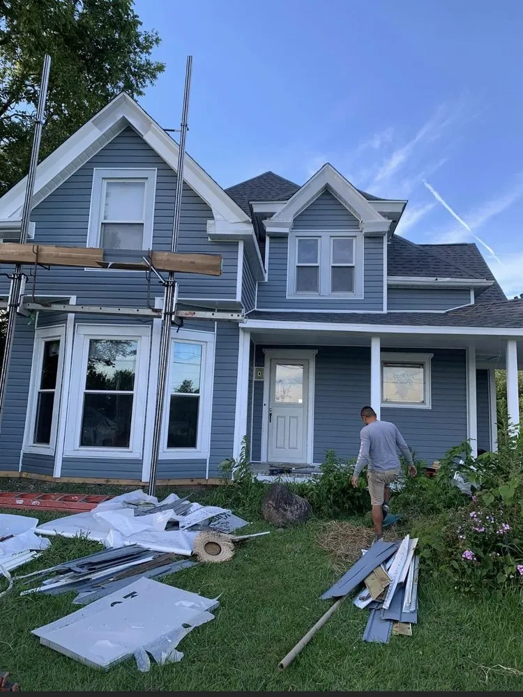 Slide of Maximond Roofing Company