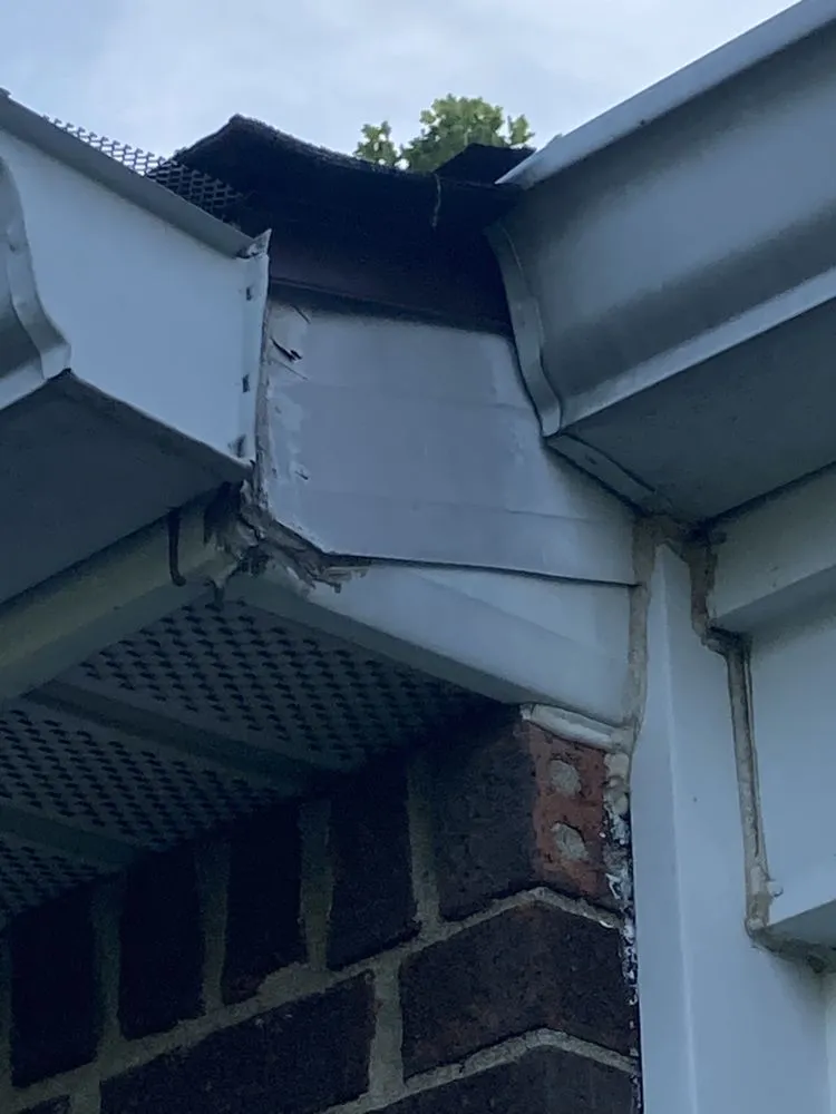 Slide of Maximond Roofing Company