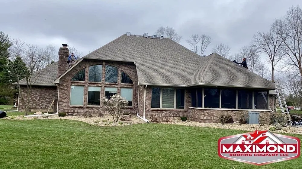 Slide of Maximond Roofing Company