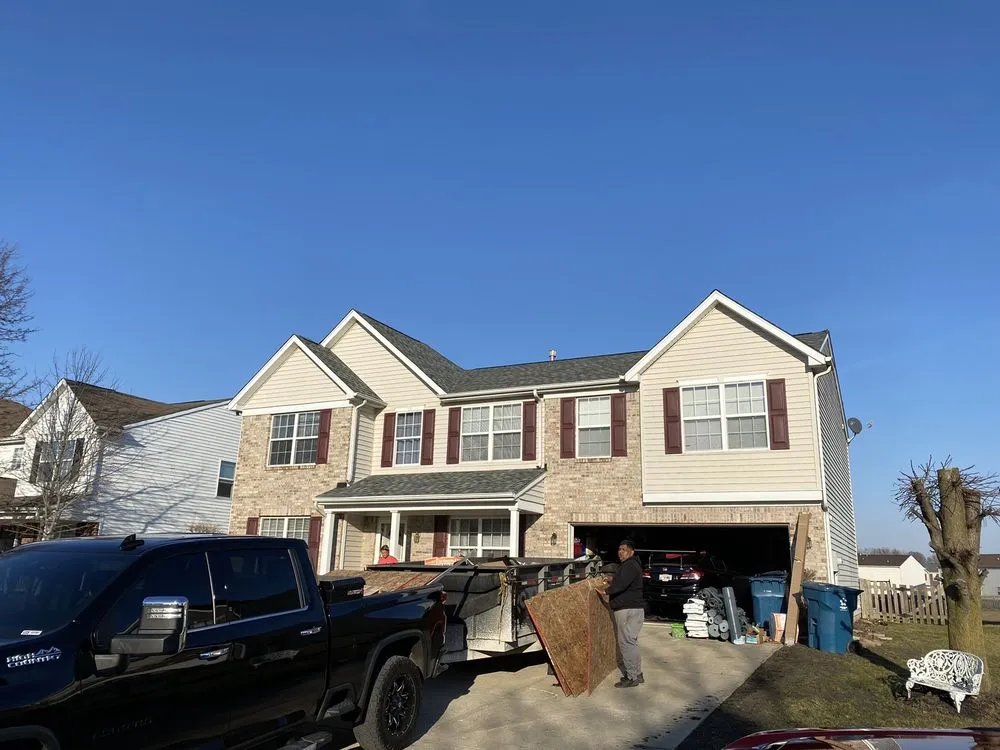 Slide of Maximond Roofing Company