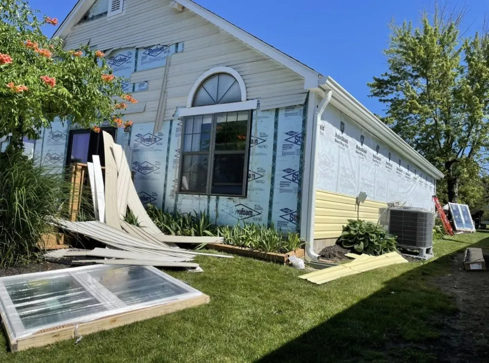 Slide of Maximond Roofing Company