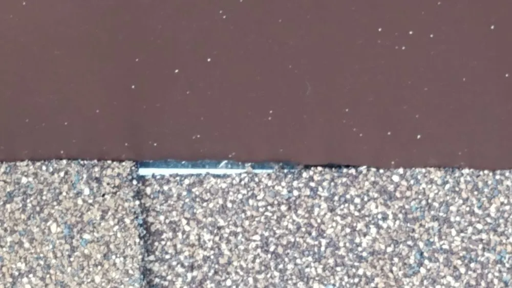 Slide of Maximond Roofing Company