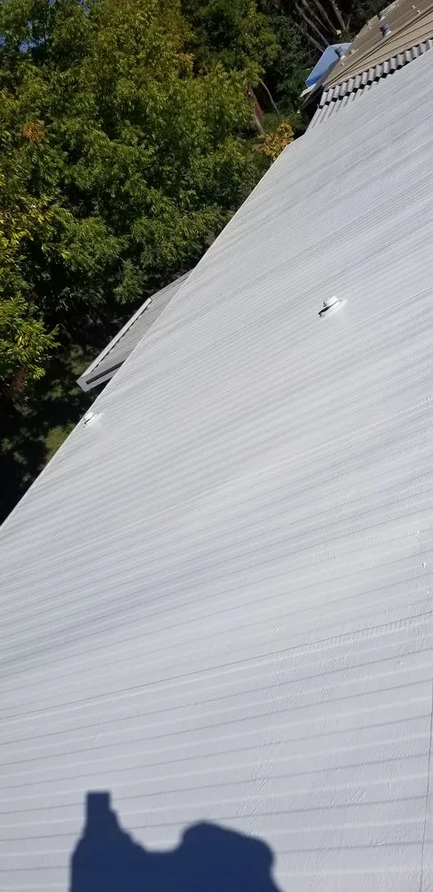 Slide of Maximus Roofing