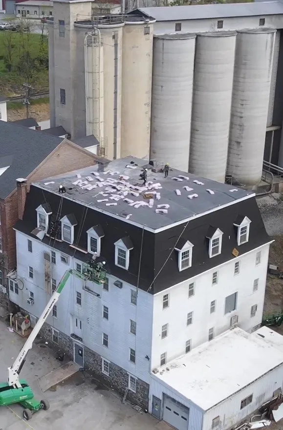 Slide of Maxwell Roofing