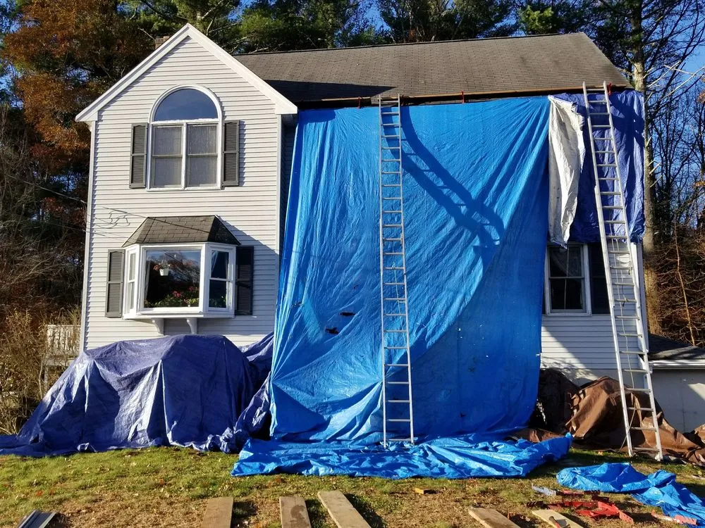 Slide of Maynard Roofing Company