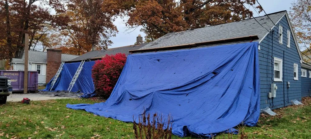 Slide of Maynard Roofing Company