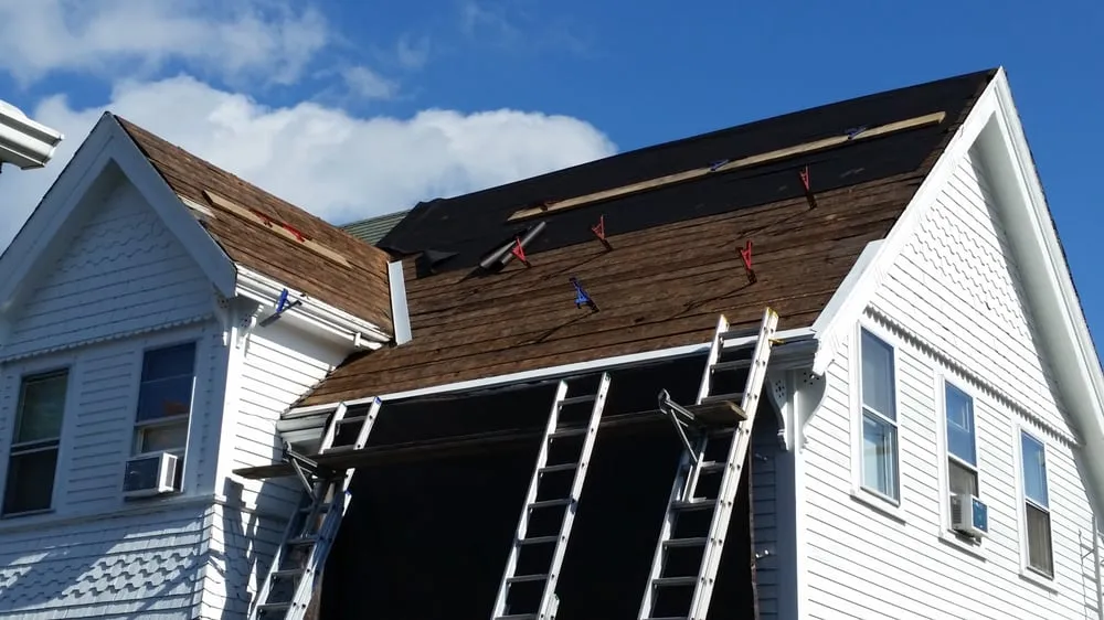 Slide of Maynard Roofing Company