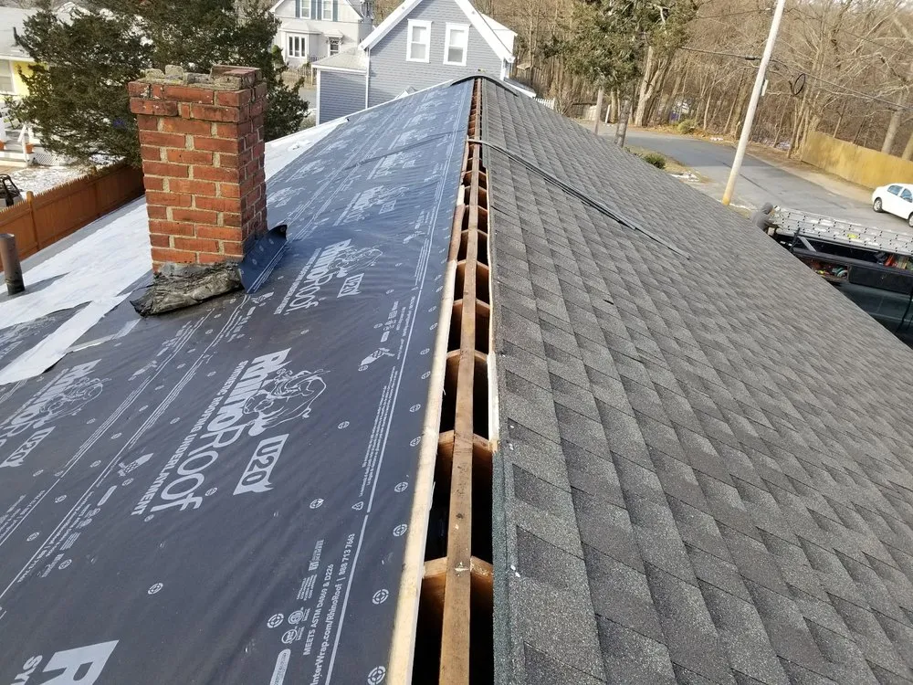 Slide of Maynard Roofing Company