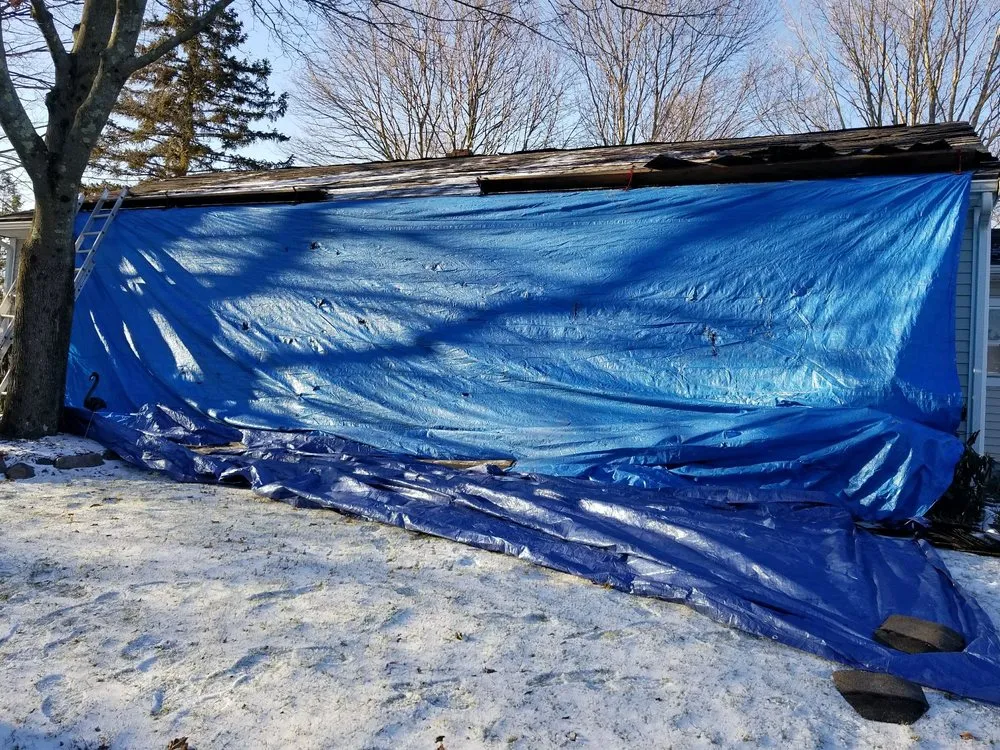 Slide of Maynard Roofing Company