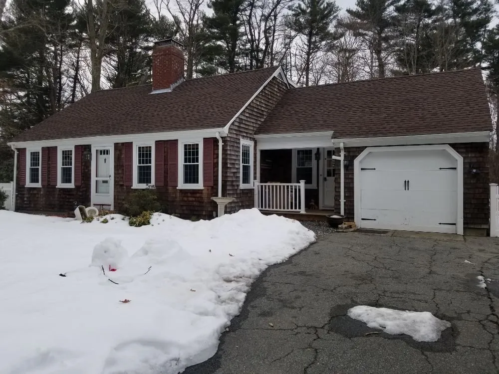 Slide of Maynard Roofing Company