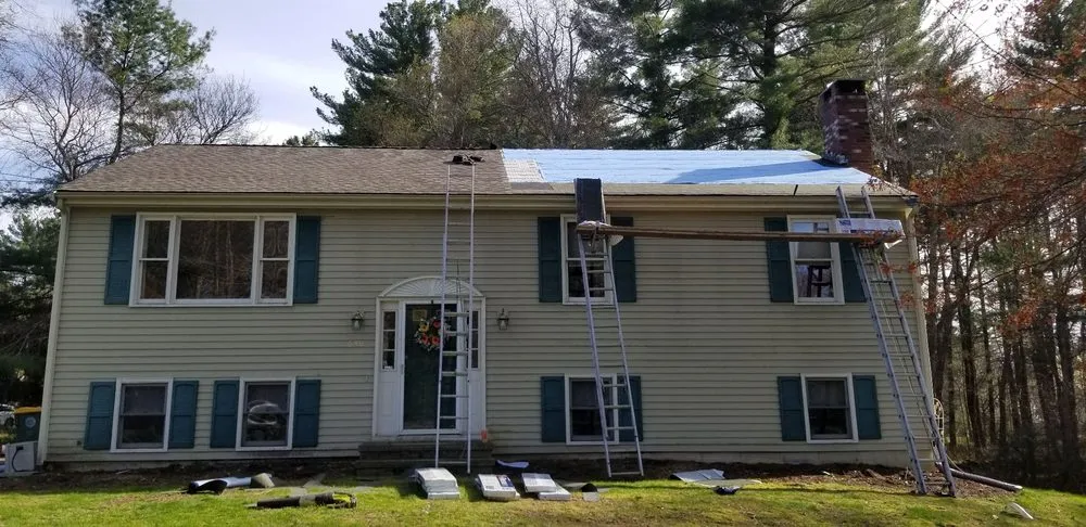 Slide of Maynard Roofing Company