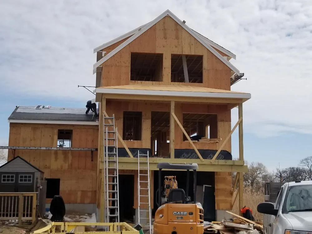 Slide of Maynard Roofing Company
