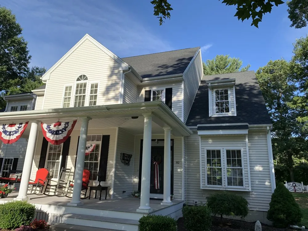 Slide of Maynard Roofing Company