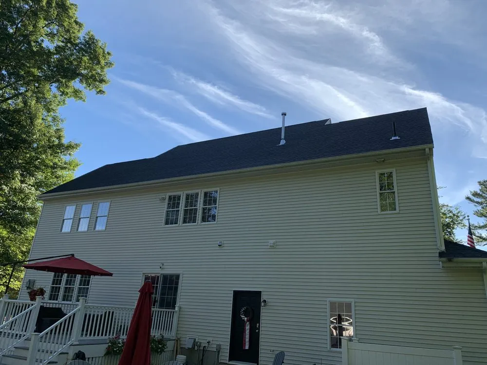 Slide of Maynard Roofing Company