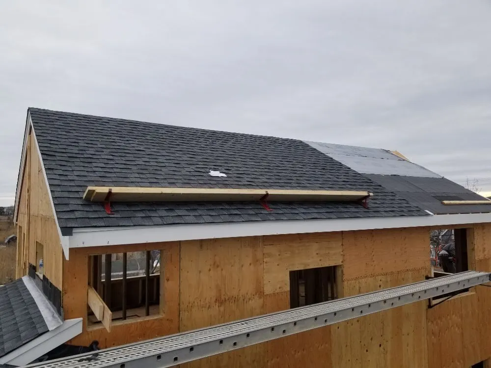 Slide of Maynard Roofing Company