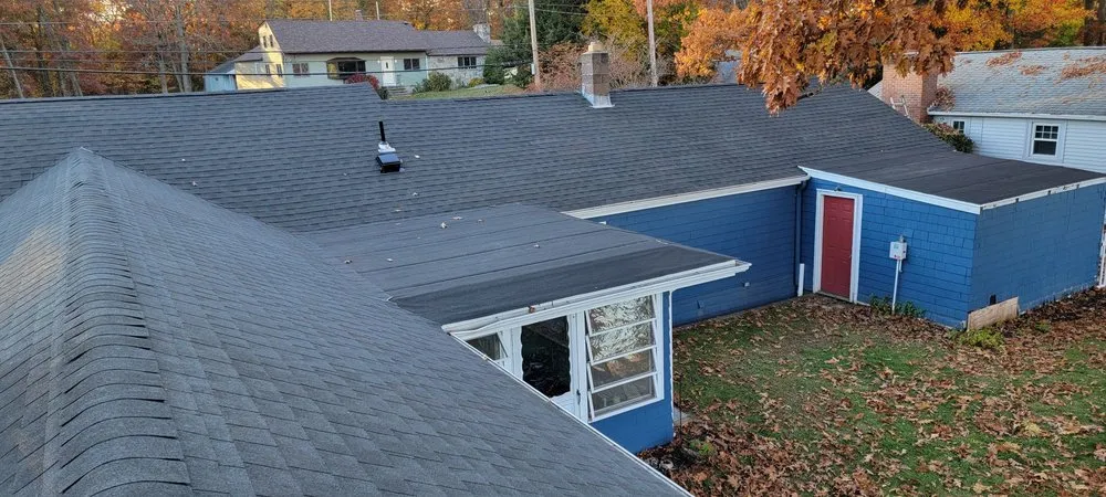 Slide of Maynard Roofing Company