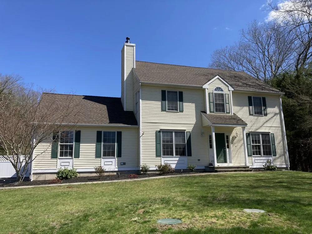 Slide of Maynard Roofing