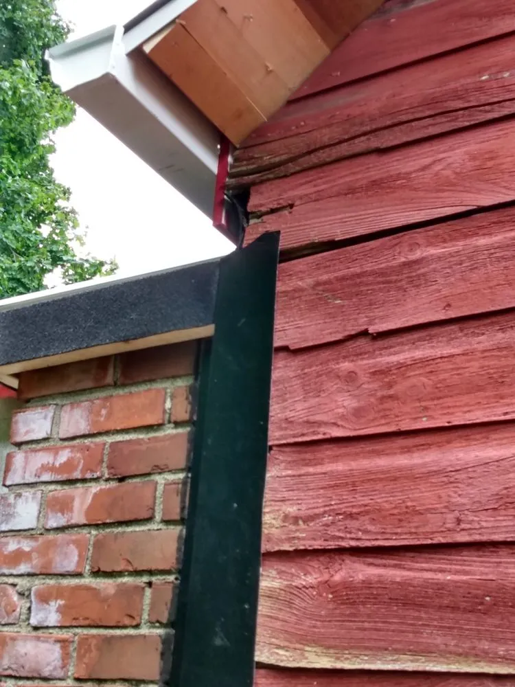 Slide of Maynard Roofing