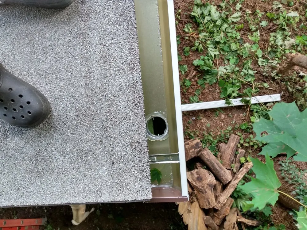 Slide of Maynard Roofing