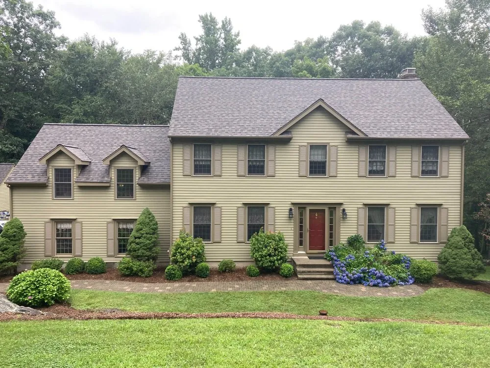 Slide of Maynard Roofing